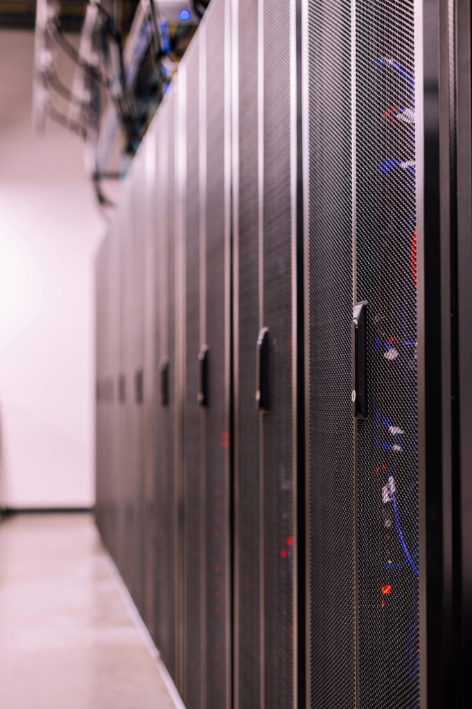 pexels-photo-5203849-5203849-1 Row of similar lockers with various optic fiber cables in modern data server room